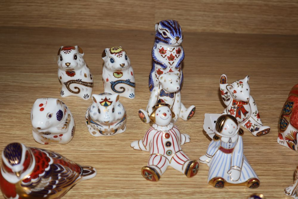 A collection of Royal Crown Derby animal clown ceramic paperweights (19)